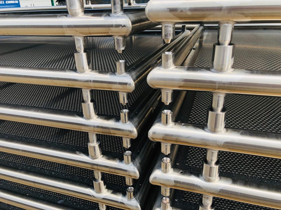 Stainless steel trays with locators