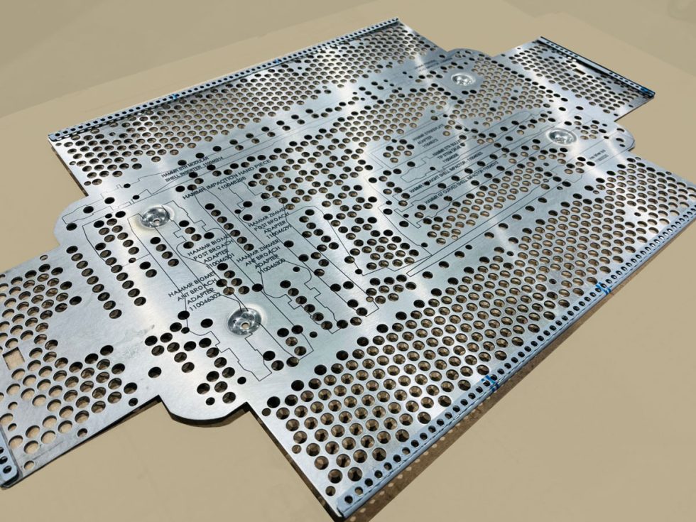 Surgical Tray flat pattern, with laser etched tool markings.